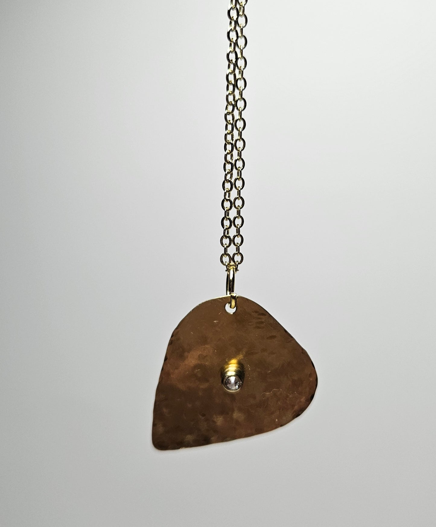 Brass guitar pick pendant