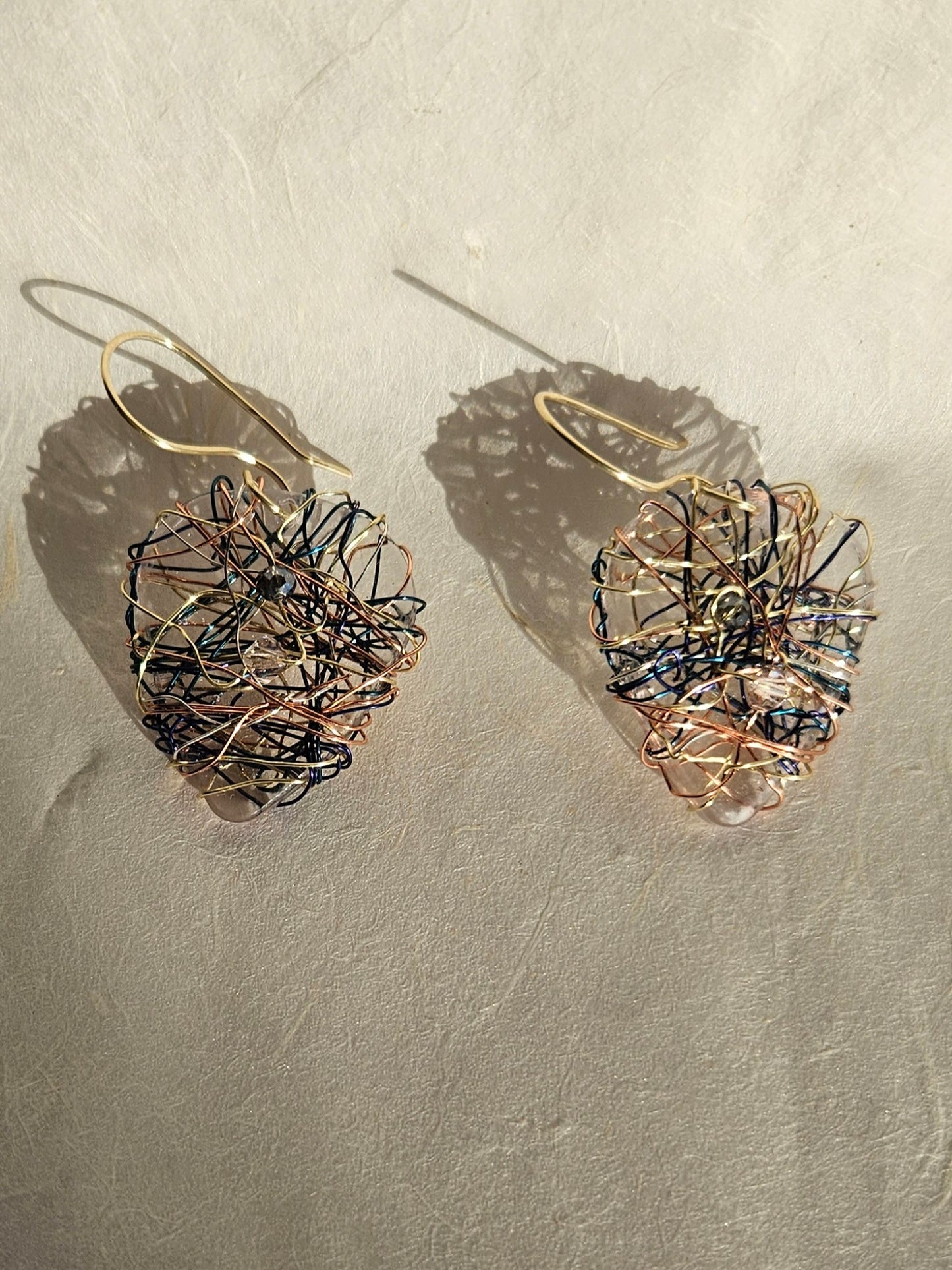 Woven wire guitar pick earrings