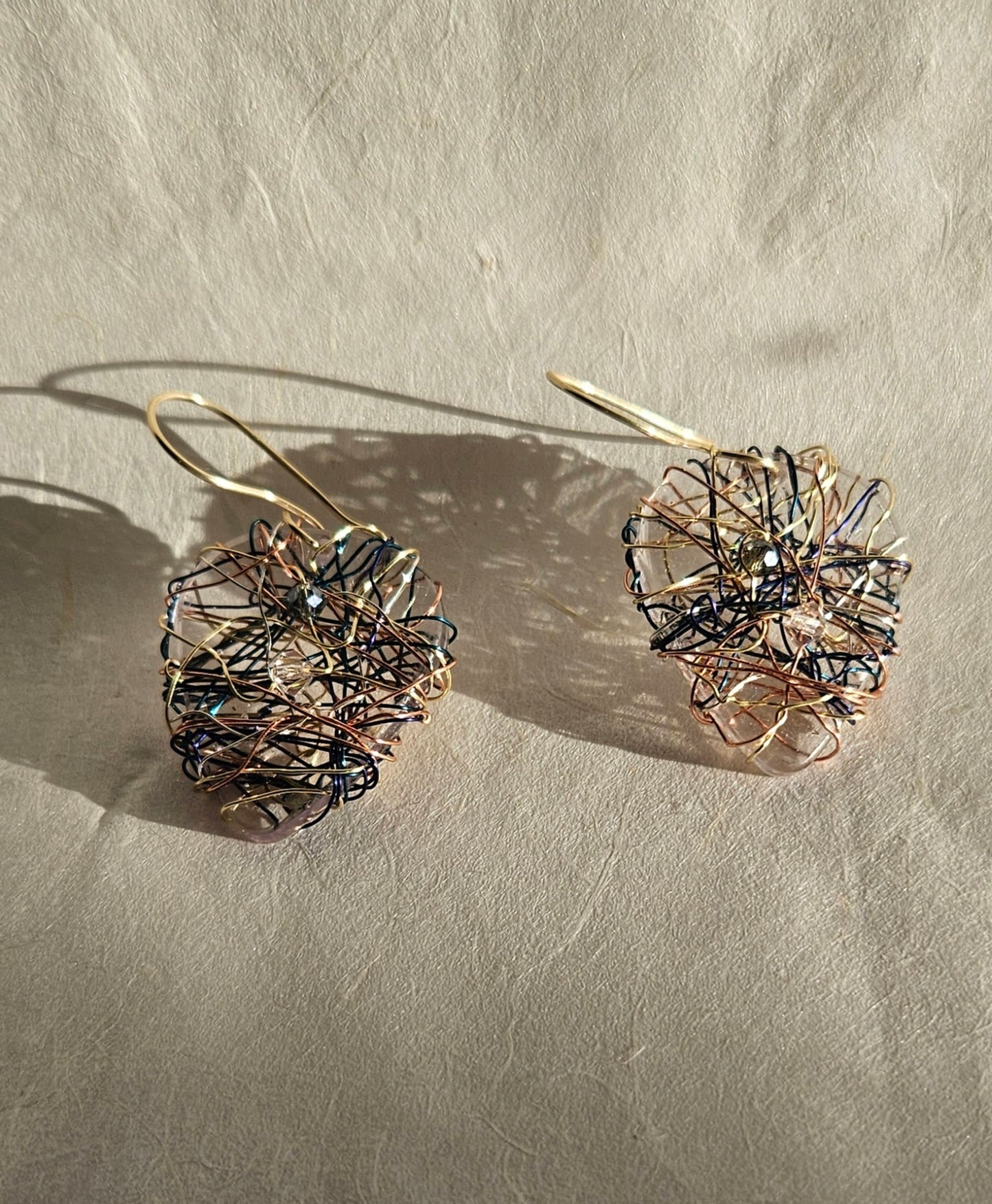 Woven wire guitar pick earrings